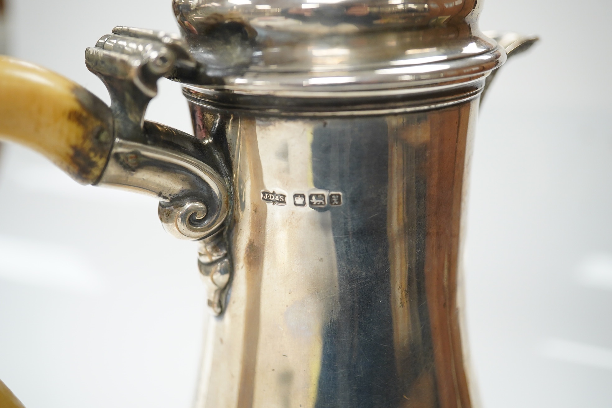A George V silver baluster hot water pot with ivory handle, makers James Dixon & Sons, Sheffield 1915, gross 19.5 oz, fair to good condition. CITES Submission reference QELNYL3Z